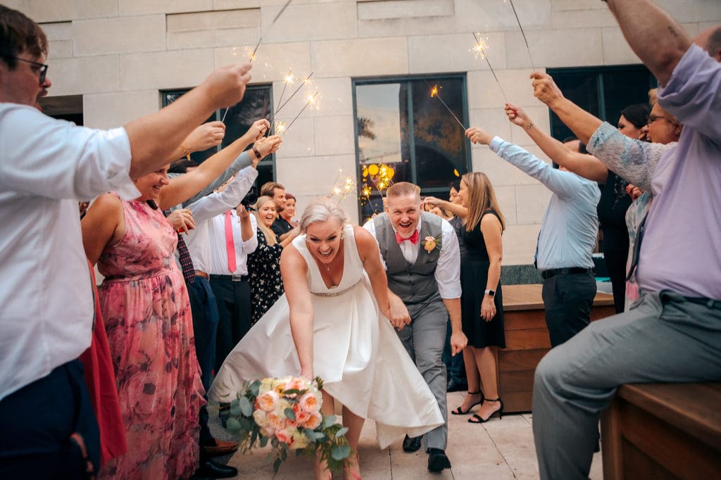 Bride and Groom Sprakler exit at DoveCote Wedding - Orlando